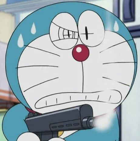 Meme Doraemon cầm súng