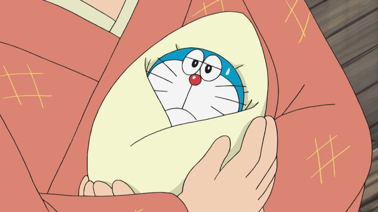 Mỗi lần buồn là muốn ôm Doraemon